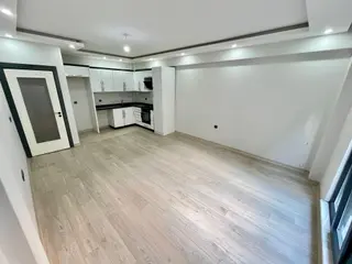 Sezgin Emlak'tan Akçay Merkez'de Sıfır Ayarında Geniş 2+1 Satılık Daire