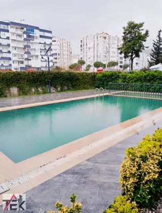 Bulvar Bayraklı'da 4+1 Sıfır Arakat Havuzlu Rezidans Satılık