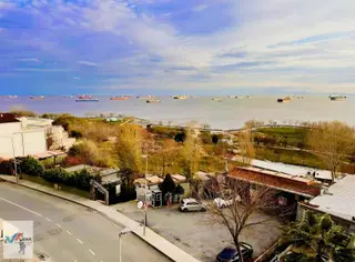 Evalmak'ta Ful Deniz Manzaralı 3+1(110m2) Asansörlü Arakat Daire