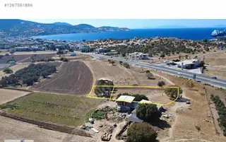 Yeni Foça Gencerlide 2114 M² 2 Tapulu Deniz Manzaralı