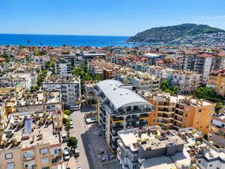 Alanya Güllerpınarı Merkezde Satılık 2+1 Havuzlu Daire