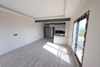 Üstünkent'ten Eski Mezitli'de Sıfır Yapıda Satılık 1+1 Daire