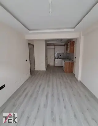 Bornova Merkeze Yürüme Mesafesinde Sıfır Geniş 1+1 Satılık
