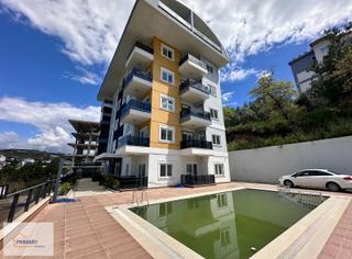 Konaklı Mahallesi'nde Deniz Manzaralı Satılık 1+1 Daire