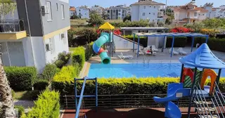 Dalaman Merkezde Çift Havuzlu Sitede 2+1 Eşyalı Kiralık Daire