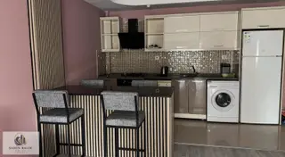 Eşyalı 34. Cadde Üstü Geniş Balkonlu Site Ansansörlü Havuzlu