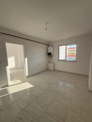 Belediye Yakını 1+1 Yerden Isıtmalı Sıfır Arakat Garajlı Apart Satılık Apart