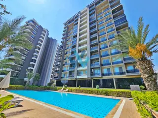 Wın'den Dora Exxen'de Deniz Manzaralı Satılık Geniş 1+1 Daire