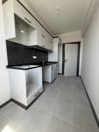 Rumeli Mahallesi'nde Merkezi Konumda Geniş 1+1 Satılık Daire