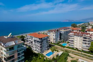 Alanya / Kestel | Denize Sıfır | Eşyalı 1+1 Satılık Daire
