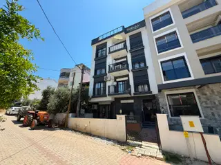 Kuşadası Davutlar’da 1+1 Full Eşyalı, Bahçeli, Sıfır Ayarında Satılık Daire