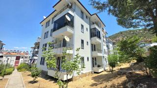 Fethiye Taşyaka'da Satılık 2+1 110m2 Bahçeli Daire