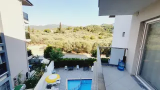 Kuşadası Davutlar'da Havuzlu Kapalı Otoparklı Kiralık 1+1 Daire