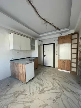Osmangazi`de~1+1~lüx~işçilikli~caddeye~yakın~site~içerisi~cazip~