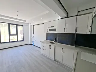 Recep Ümit Emlak'tan Çevre Yolu Ve Esenli Caddesi Yakını 1+1 Asansörlü Satılık Ferah Daire