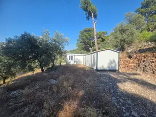 Fırsat ! Göcek'e 6 Km 1 Dönüm Çit Çevrili Arazi Ve 2 Konteyner