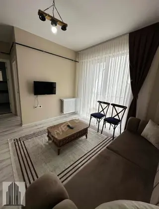 Körfez'de Tramvaya Yakın Eşyalı 1+1 Daire
