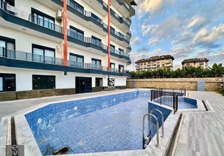 Alanya Okurcalar'da Kiralık 3+1 Eşyalı Deniz Manzaralı Dubleks Daire
