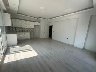 Güllük'te Merkeze Yakın Konumda Satılık 2+1 Daire
