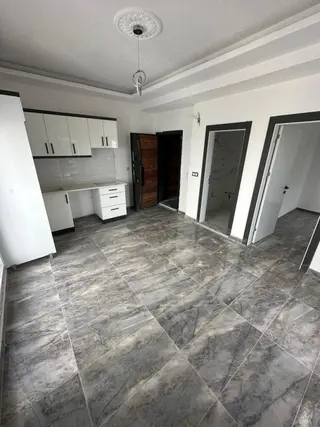 Didim Hisar Mahallesin'de Asansörlü Uygun Fiyata Sıfır 1+1 Daire