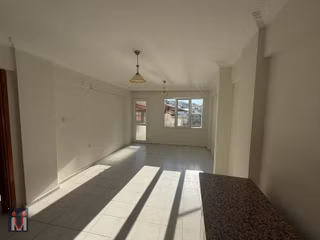 Dikili'de Denize 200'metre Gazipaşa'da Merkezi 2+1 Kiralık Daire
