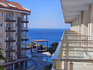 Kuşadası Ramada Suites'te Satılık Deniz Manzaralı 1+0 Daire