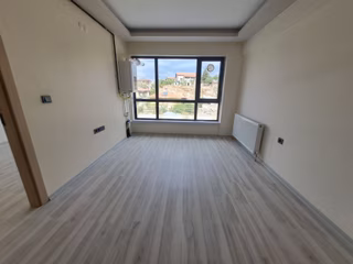 Alaçatı Gayrimenkulden İncek'te Kiralık 1+1 Daire