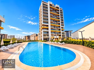 Altıntaş'ta Konsept Sitede Deniz Ve Havuz Manzaralı 1+1 Satılık