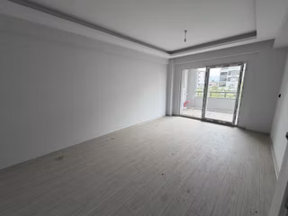 Yağmur Emlak'tan Merkezi Konumda 2+1 Sıfır Satılık Daire