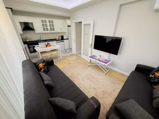 Çiftlikköy'de Yeni Bina Modern Konseptte Full Eşyalı 1+1 Daire