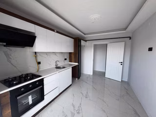 Menemen Uğur Mumcu’da Sıfır Ebeveyn Banyo 3+1 Otoparklı Kiralık Daire