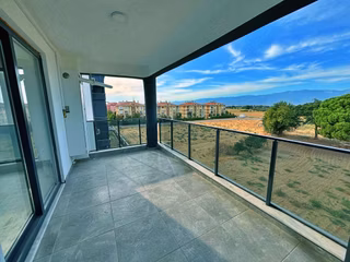 Uytundan Burhaniye Bahçelievler'de Asansörlü Arakat Kiralık 2+1