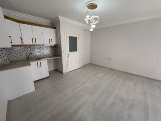 Kostak Gayrimenkul'den Akçay Merkez'de Özel Kullanımlı 2+1 Daire