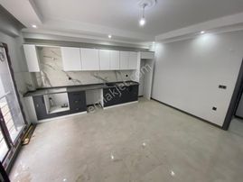 Ateş Emlak’tan Yerden Isıtma Ful Seramik 1+1 Satılık Daire