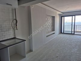 Asansör Bölgesinde Yeni Binada Deniz Manzaralı Satılık 2+1 Daire