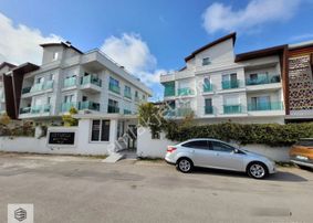 Güzeloba'da Artuklu Konutlarında 1+1 Giriş Katı