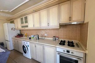 Didim Efeler Mahallesinde Merkezi Konumda Ful Eşyalı 2+1 Satılık Ara Kat Daire