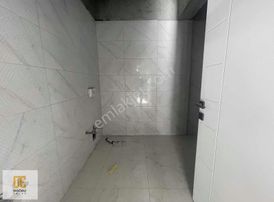 Doğru Emlak - Osman Gazi'de Düşük Katlı Kombili 3+1 Daireler