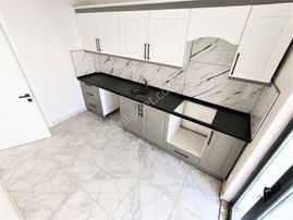 💥burhaniye Bahçelievler'de💥aygül'den Ayrı Mutfak Doğalgaz Yerden Isınmalı Kaçmaz 2+1 Satılık Daire