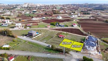 Oyumcada Deniz Manzaralı 3 Kat 20m.yola Cephe Arsa