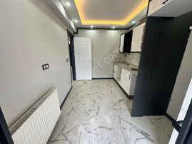 Zeki Emlak'tan Yeni Mahalle'de 2+1 Kapalı Mutfak Satılık Daire