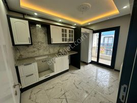 Zeki Emlak'tan Yeni Mahalle'de 2+1 Kapalı Mutfak Satılık Daire