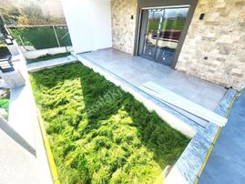 Burhaniye Ören'de Aygülden Sıfır Bahçe Kullanımlı Denize Yakın Ön Cephe Doğalgazlı 1+1 Satılık Daire