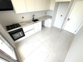 Aygül'den Edremit Zeytinli'de Muhteşem Doğa Manzaralı Sıfır Çift Cephe Ayrı Mutfak 2+1 Satılık Daire