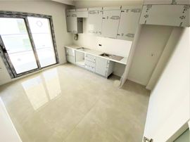 Burhaniye Ören'de Aygül'den Site İçin'de Yerden Isıtmalı Havuzlu Otoparklı Lüks 3+1 Satılık Daireler