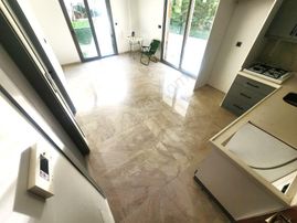 Burhaniye Ören'de Aygülden Sıfır Mustakil Tadında Bahçe Kullanımlı Yerden Isınmalı 1+1 Satılık Daire