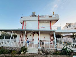 Kuşadası Davutlar Sahilinde Geniş Bahçeli 3+1 Satılık Villa