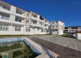 Kumbağ'da Satılık Sıfır 1 +1 Daire Havuzlu Sahil Emlak'tan