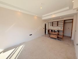 Kuşadası Güzelçamlı’da Oturma Hazır Bahçeli Satılık 2+1 Daire