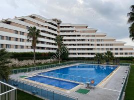 Ayrancılar İnönü Mahallesi’nde Grand Life Sitesi‘nde Ara Kat 2 + 1 Havuz Cepheli Satılık Daire